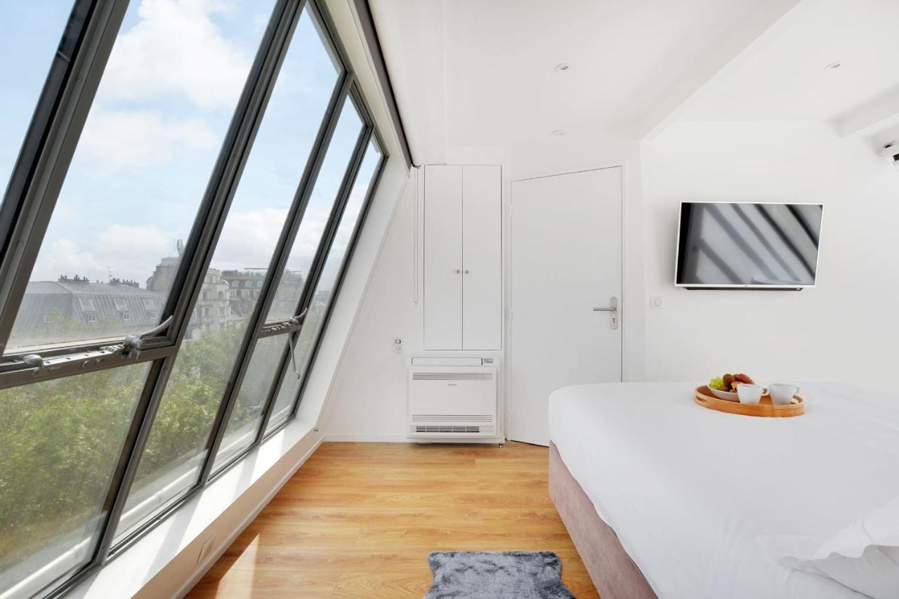 Appartamento Exceptional Triplex With Terrace - Montmartre Parigi Esterno foto